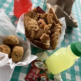 Fried Catfish , Shrimp , French Fries , Seafood Boulin  Delicious Lemonade + Kool-Aid