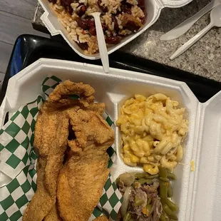 Fried catfish platter with green beans, mac n cheese, and red beans in rice