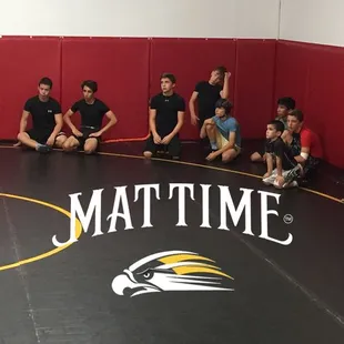 Soaking in some wrestling knowledge.