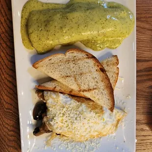 a plate of food and a pickle