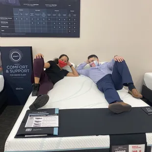 My beautiful girlfriend and I are excited to sleep on our new bed.