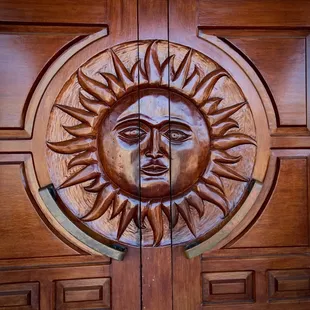Carved wooden entrance doors