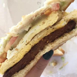 Hot sausage with egg, fully dressed.