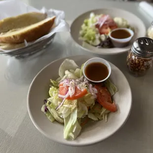Garden salads with balsamic vinegarette dressing - also comes with garlic bread.