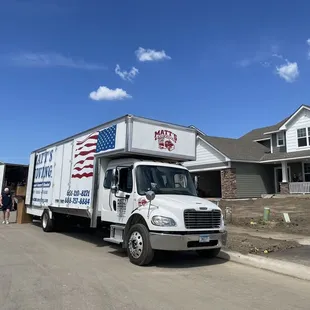 Me, Part of my moving crew, the trucks and my movers in action!