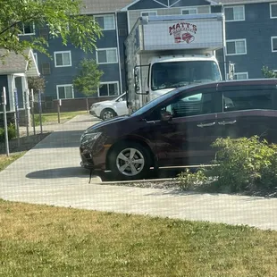 Matt's moving truck parking across all handicapped parking spots illegally!