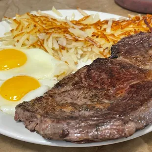 Ribeye and eggs come with two sides of your choice.