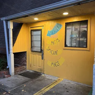This is the only entrance which is located on the left side of the building
