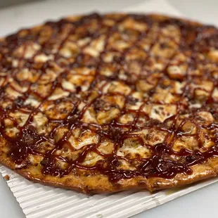 Chicken Bacon BBQ pizza with a thin crust
