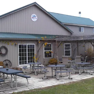 patio area with tables and chairs
