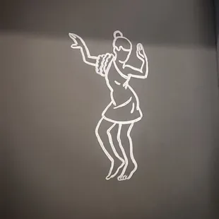 a drawing of a woman on a toilet