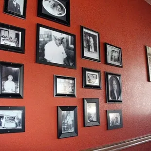 a wall of family photos