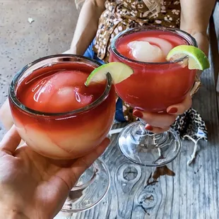 Hibiscus Frozen Swirl Margarita (left), Prickly Pear Frozen Swirl Margarita (right)