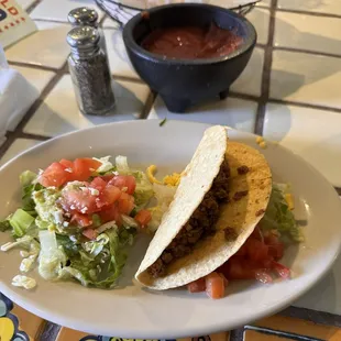 Taco and Guacamole salad, with salsa behind.