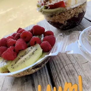a plate of fruit and a bowl of oatmeal