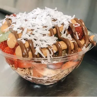 a bowl of fruit and nuts