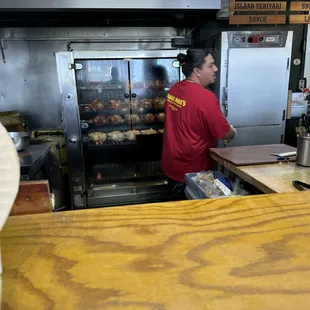 They were loading up the rack of chicken to be rotisserie.