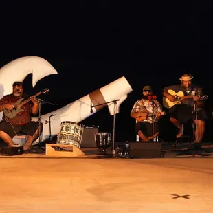 a group of men playing instruments
