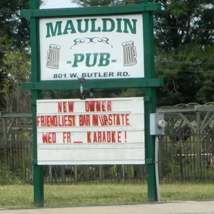 a sign for a new owner