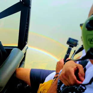 Oahu, Hawaii.  Private helicopter tour with doors off.  Double Rainbows.