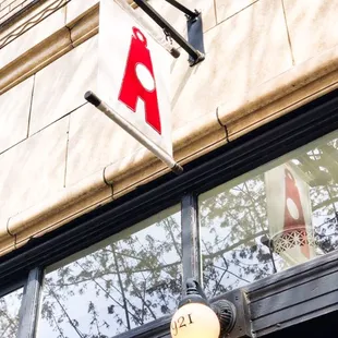 a red and white sign on a building