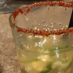 The poor presentation of the spicy pineapple margarita (notice the muddled n seedy jalapeño, and the few chunks of pineapple)