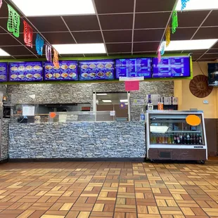 Front counter, menu and kitchen.