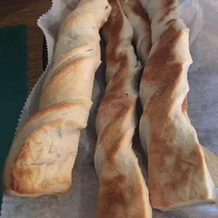 Unappetizing breadsticks. Too much salt, and too much of an uncooked dough and flour taste.
