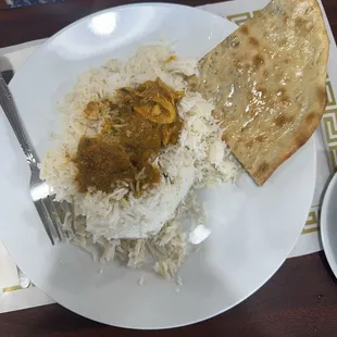 Large portion of rice accompanying the Chicken Curry