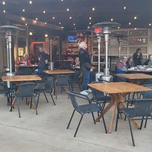 Covered outdoor seating with lots of heaters