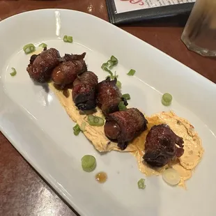Bacon wrapped dates. Perfect salty and sweet.