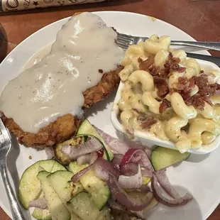 Chicken fried steak with veggies and bacon Mac and cheese. Absolutely the best chicken fried steak I have ever eaten. So tender.