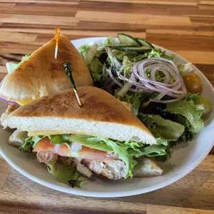 Chicken Sandwich with a side salad.