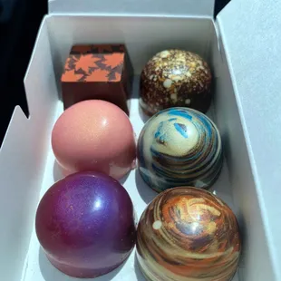 Maple Pecan, Peanut Butter, Lemon Raspberry, Five Spice Praline, Red Wine, Hazelnut