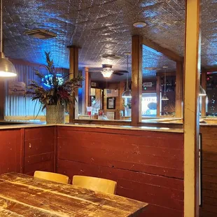 a wooden table and chairs