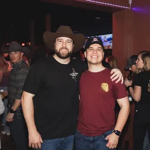 two men posing for a picture