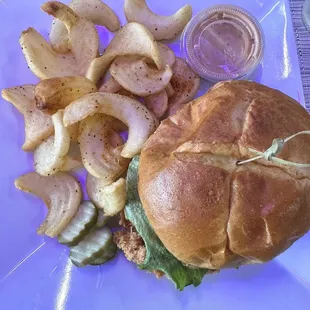 Chicken sammie with fries. The chicken is two big hand dipped tenders.