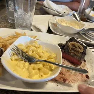 Rare kc strip, with delicious Mac n cheese and truffle fries.