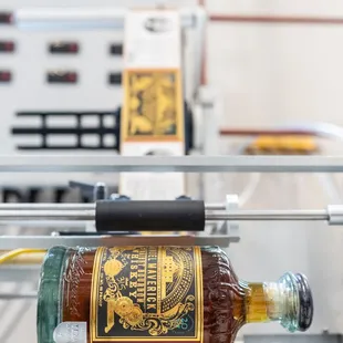 a bottle on a conveyor belt