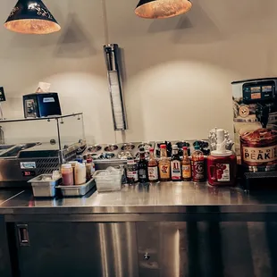 a kitchen with a stainless steel counter