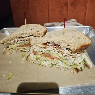 A very large turkey and avocado sandwich.