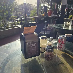 Sunny outside seating shared by all the restaurants in 'The Market"