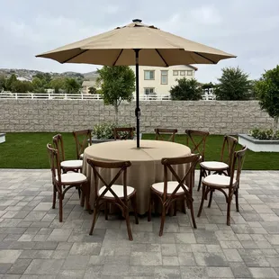 Marquee umbrellas with cross back chairs 

if you haven't booked now's the time!