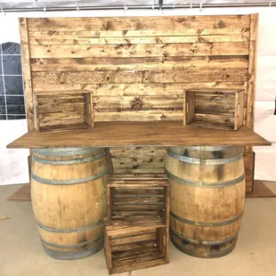 Wood setup #1   Wood setup includes  Wood wall  Wood barrels table  4 wood crates