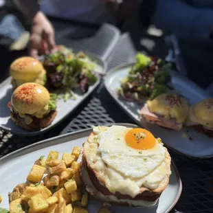 Vegetarian Benedict, another regular Benedict and croque madame! Yum!