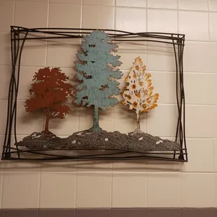 Wall art outside bathrooms