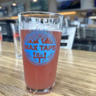 a glass of beer on a table