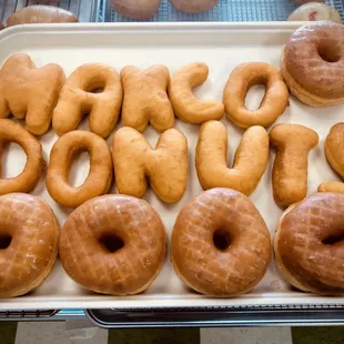 Lettered and glazed donuts