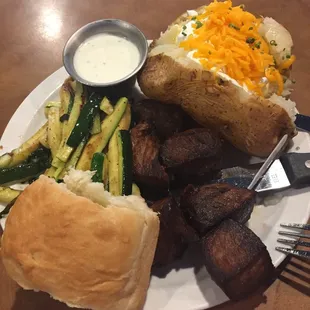 Maxey's Special.  Select choice sirloin cut and marinated in a fabulous curry sauce and then deep fried with a loaded potato and zucchini.