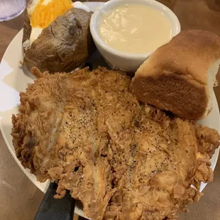 Chicken fried chicken, gravy on the side &amp; loaded baked potato.